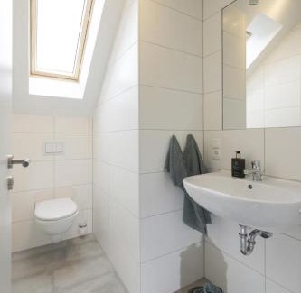Nordhorn Casa | Haus Norwald - tolles Ferienhaus direkt am See für bis zu 4 Personen mit Sauna und Kaminofen - Haustiere herzlich willkommen