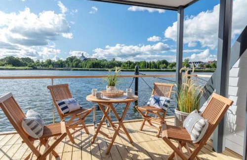 Schleswig Alquiler De Eote | Hausboot Aegir mit Dachterrasse in Schleswig am Ostseefjord Schlei