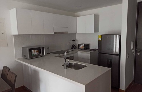 Centro International Apartamento | Hermoso, garaje, Piscina, zona húmeda, gimnasio, terraza comunal, internet tv