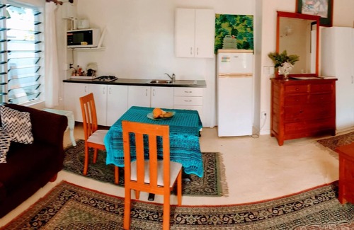 Matavera Apartamento | Heron s Reef Holiday Apartments, privado, autocontenido, de valor, en el paseo marítimo