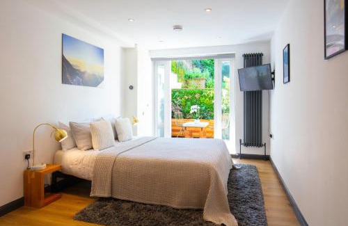 Coldharbour Apartamento | Hidden Retreat with Steam room, KING bed near tube