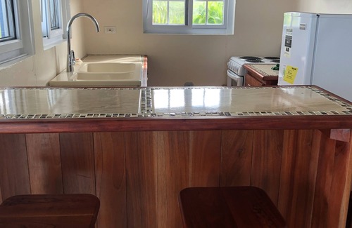 Lucea Apartamento | Hilltop Studio with ocean views, free daily breakfast and airport pickup.
