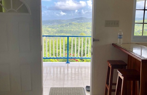 Lucea Apartamento | Hilltop Studio with ocean views, free daily breakfast and airport pickup.