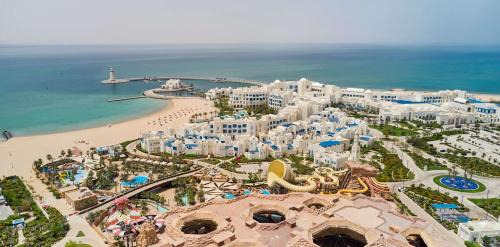 Abu Samra Complejo | Hilton Salwa Beach Resort and Villas