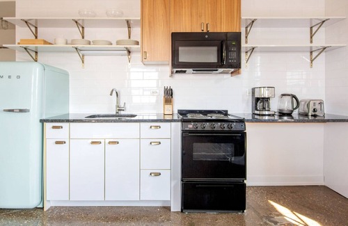 Uptown Apartamento | Hip Uptown 1BR w/ Rooftop & Grills, nr Hospital & Beach, by Blueground