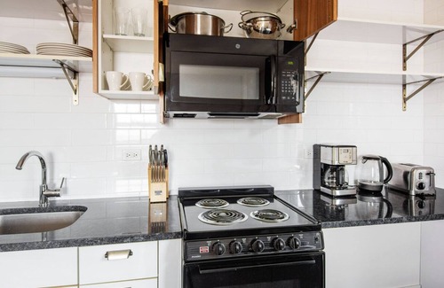 Uptown Apartamento | Hip Uptown 1BR w/ Rooftop & Grills, nr Hospital & Beach, by Blueground