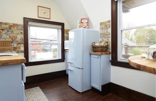 Highland Park Casa | Historic "Chauffeurs Quarters" Tiny House by Midtown, on Studebaker Estate