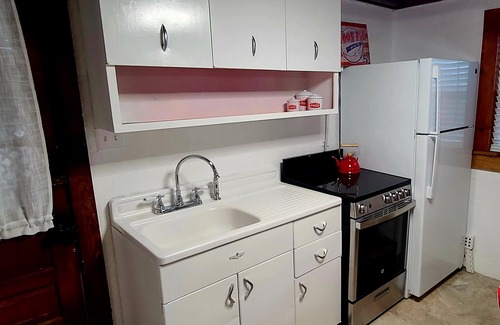 Colington Cabaña | Historic Cottage Steps from the Beach and Dog Friendly!