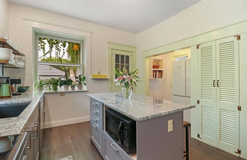 Racine Casa | Historic house on tree lined red brick street of historic homes.