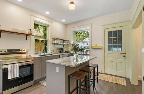 Racine Casa | Historic house on tree lined red brick street of historic homes.