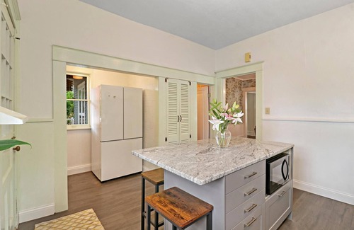 Racine Casa | Historic house on tree lined red brick street of historic homes.