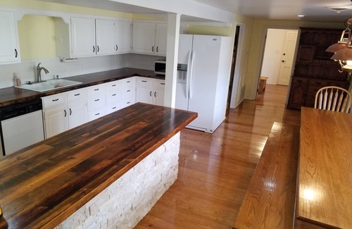 Camdenton Casa | Historic Limestone House in park setting in Ozarks