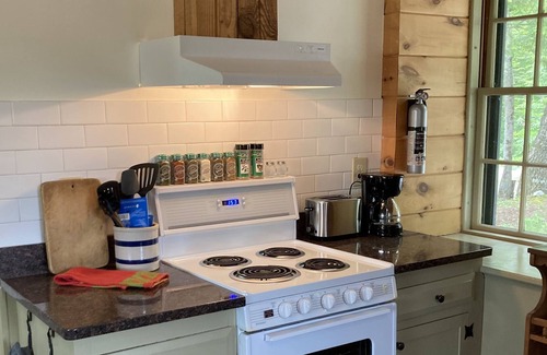 Center Harbor Cabaña | Historic Stone Cottage