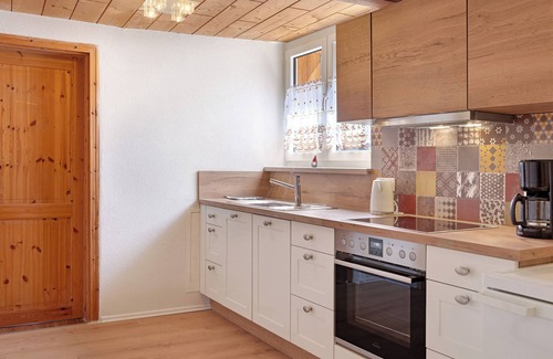 Bischofsheim an der Rhon Apartamento | Apartamento vacacional 'Al pie del Kreuzberg' con Wi-Fi