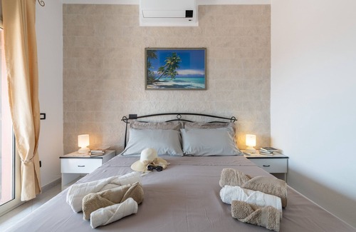 Eden Rock Casa | Casa de vacaciones "Villa Libeccio" con vistas al mar, jardín y aire acondicionado