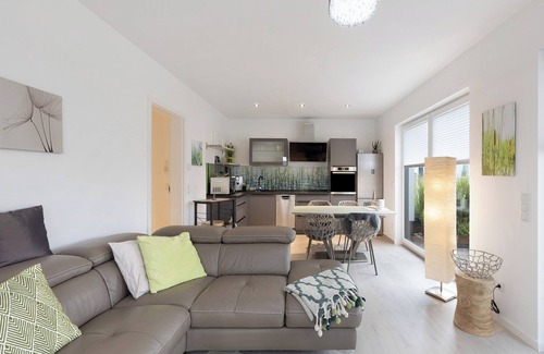 Muldestausee Apartamento | Apartamento vacacional "20b Am Goitzsche See" con vistas al lago, terraza privada y Wi-Fi
