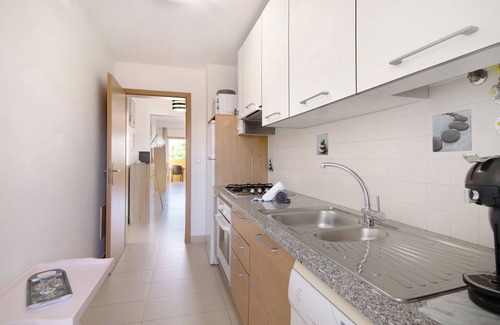 Canada Apartamento | Apartamento vacacional "Royal Cabanas Golf 89" con vistas al mar, piscina compartida y terraza