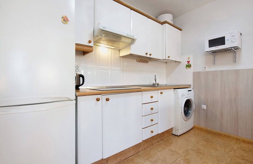 Caleta de Fuste Apartamento | Apartamento vacacional "Paulalucía" con vistas a la montaña, piscina compartida y Wi-Fi
