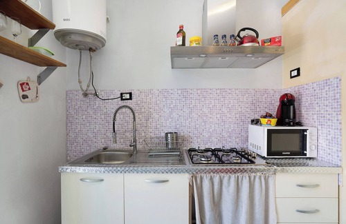 La Spezia Apartamento | Apartamento vacacional Acciuga House con balcón, jardín compartido y Wi-Fi