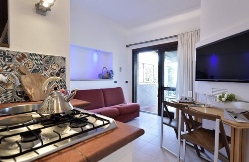 Porto San Paolo Apartamento | Holiday apartments L'Ea di Lavru SEA VIEW 2-rooms apartment-TOP INTERIOR DESIGN