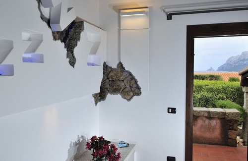 Porto San Paolo Apartamento | Holiday apartments L'Ea di Lavru SEA VIEW 2-rooms apartment-TOP INTERIOR DESIGN