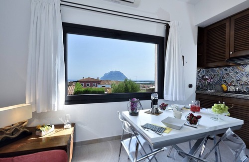 Porto San Paolo Apartamento | Holiday apartments L'Ea di Lavru SEA VIEW 3-rooms apartment-TOP INTERIOR DESIGN