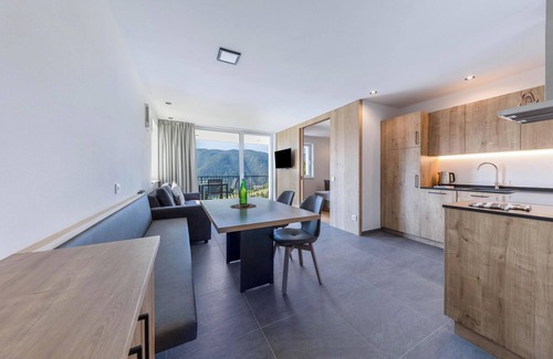 Renon Apartamento | Apartamento vacacional "Thalerhof Naturae Montes Ritten" con vistas a la montaña, terraza y Wi-Fi