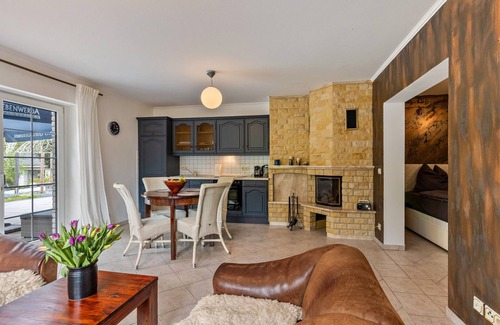 Groß Lindow Apartamento | Apartamento vacacional 'Am Wasser' con vistas al lago, terraza comunitaria y Wi-Fi