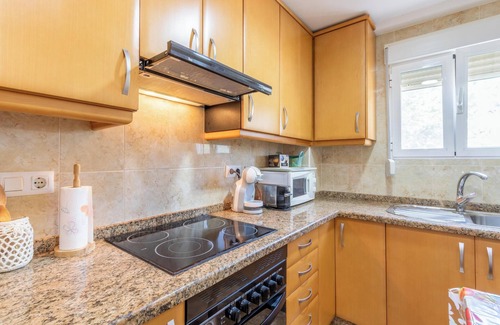 Les Deveses Apartamento | Apartamento vacacional "El Cid" con vistas al mar, piscina, jardín y terraza