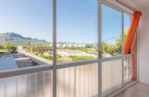 Les Deveses Apartamento | Apartamento vacacional "El Cid" con vistas al mar, piscina, jardín y terraza