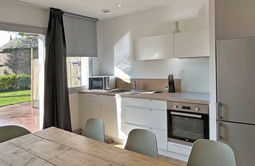 Hillion Apartamento | Apartamento vacacional "Au Colombier" con terraza privada y jardín compartido