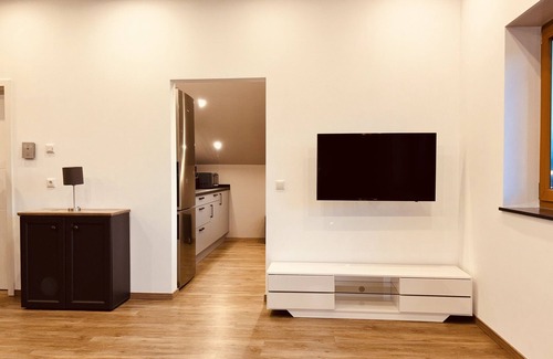 Schluechtern Apartamento | Apartamento vacacional "Blick Bergwinkel" con jardín privado