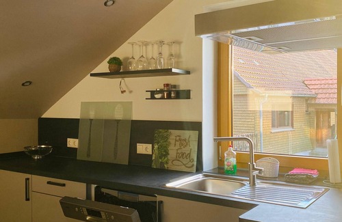 Schluechtern Apartamento | Apartamento vacacional "Blick Bergwinkel" con jardín privado