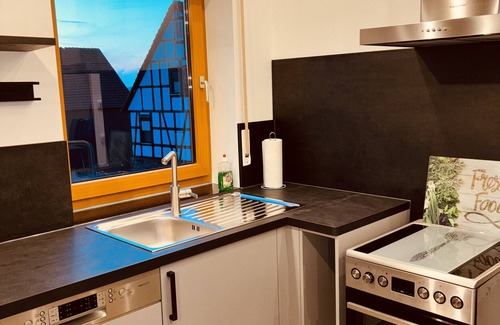 Schluechtern Apartamento | Apartamento vacacional "Blick Bergwinkel" con jardín privado