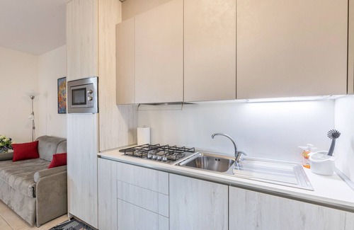 San Benedetto di Lugana Apartamento | Apartamento vacacional "Casa Punta Grò" con piscina compartida, terraza y Wi-Fi