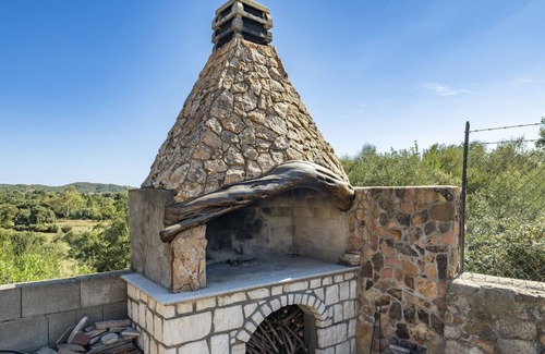 Baunei Apartamento | Casa de vacaciones Casa Marinella con vistas a la montaña y jardín