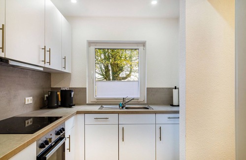 Altengroden Apartamento | Apartamento vacacional 'Wellenrauschen' con jardín, terraza, bañera de hidromasaje y Wi-Fi