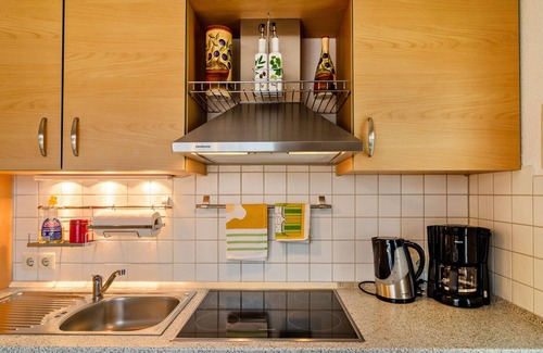 Riepe Apartamento | Apartamento vacacional "Gerken Amselnest" con terraza privada, jardín privado y Wi-Fi