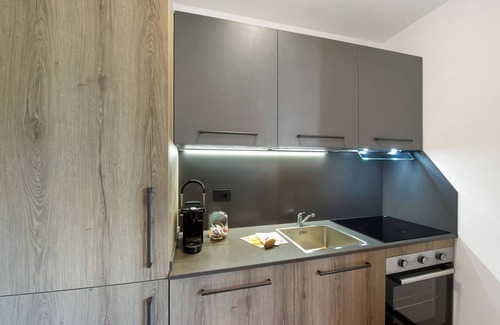 Brusson Apartamento | Apartamento vacacional "La Tua Casa A Brusson" con vistas a la montaña y jardín compartido