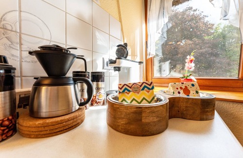 Fockbek Apartamento | Apartamento vacacional 'Lütt Stuv' con terraza privada, jardín comunitario y Wi-Fi