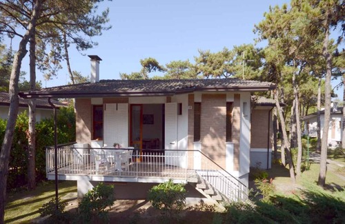 Lignano Pineta Apartamento | Apartamento vacacional con garaje privado que incluye paquete de playa