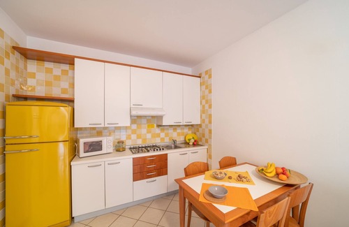 Bibione Lido del Sole Apartamento | Apartamento vacacional con un tejado cubierto
