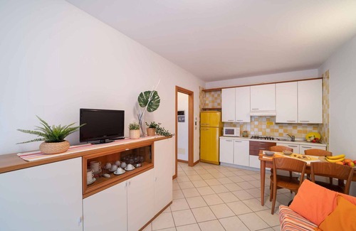 Bibione Lido del Sole Apartamento | Apartamento vacacional con un tejado cubierto