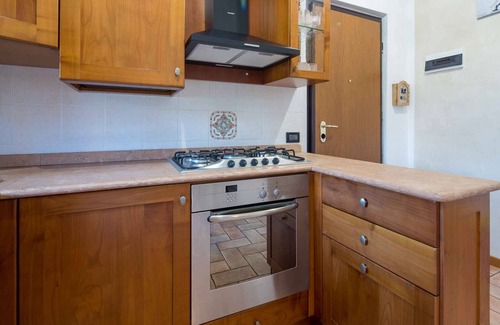 Montioni Apartamento | Apartamento vacacional cerca del centro con piscina, aire acondicionado, parking