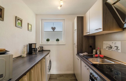 Wangerland Apartamento | Apartamento vacacional 'Nordsee' con terraza compartida, jardín compartido y Wi-Fi