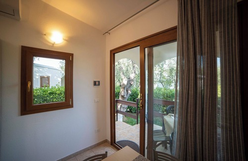 Mattinata Casa | Confortevole Casa Vacanza Orchidea con piscina y playa privada