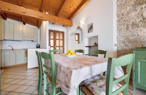 Oldesio Apartamento | Apartamento vacacional 'Rustico Spagnol 4' con vistas al lago, piscina y Wi-Fi