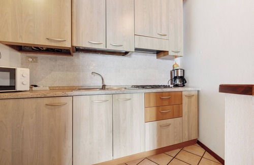 Oldesio Apartamento | Apartamento vacacional 'Rustico Spagnol 4' con vistas al lago, piscina y Wi-Fi