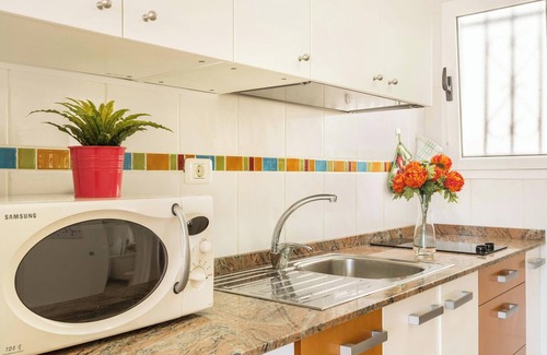 Puerto Rico Apartamento | Apartamento vacacional 'Sweet Home' con aire acondicionado, terraza y piscina compartida