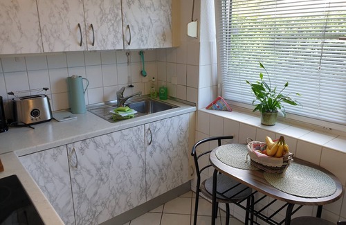 Schilksee Apartamento | Apartamento vacacional 'Strandperle-Schilksee' con vistas al mar, jardín comunitario y Wi-Fi
